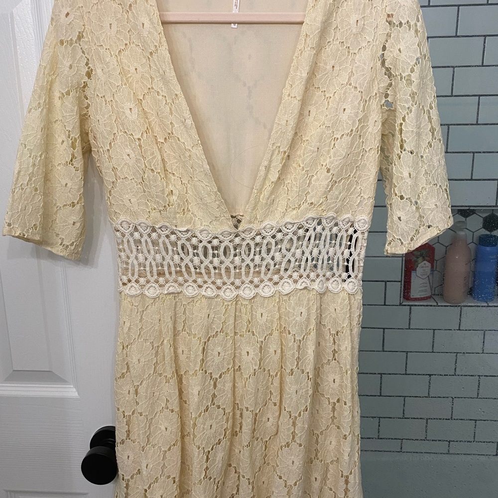 Free the people lace tunic, low cut, beautiful. Excellent used condition.